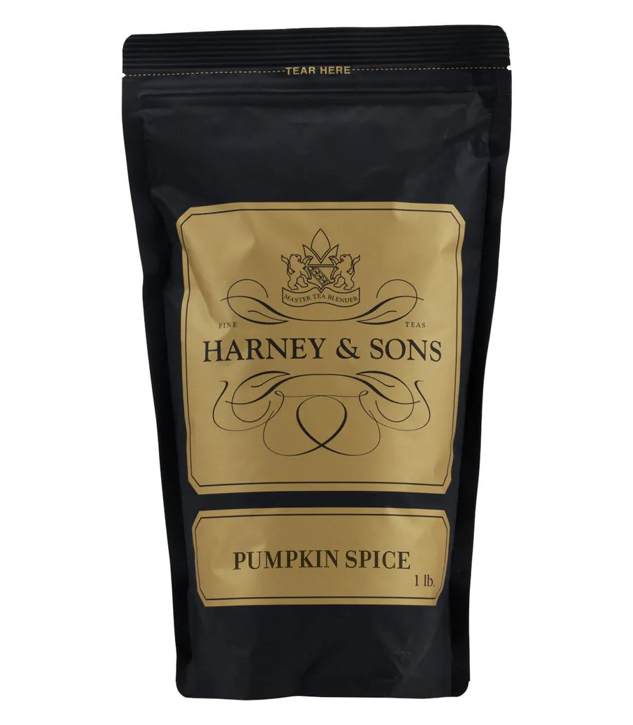 Black packaging of Harney & Sons Pumpkin Spice tea, featuring gold accents and a tear-off top.